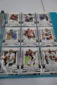 lot 59 image: Binder of Football Trading Cards Featuring NFL and College Stars