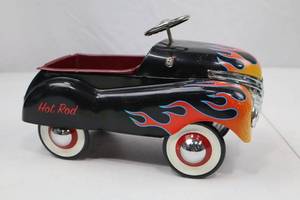 lot 71 image: Tin Hot Rod Pedal Car Toy with Flame Graphics