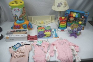 lot 87 image: Large Baby and Toddler Essentials Bundle Toys, Clothes, and Accessories