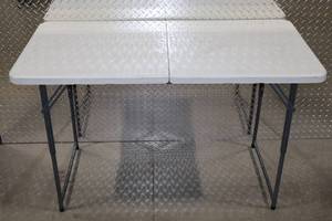 lot 93 image: Folding Plastic Utility Table with Carry Handle -  48 W x 29 H