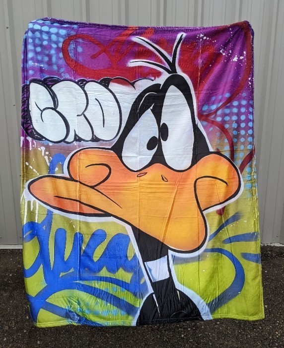 lot 83E image: Looney Toons Daffy Duck Throw Blanket, 50 x 60 - Brand New