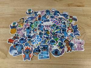 lot 176 image: 50 Disney Stitch Stickers - Brand New