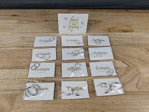 lot 251 image: 12 Pairs Fyshipin Silver Color Pierced Earrings - Brand New