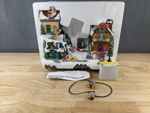 lot 328 image: Disney Musical Ski Village Christmas Decor