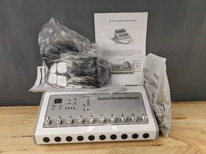 lot 28A image: 10 Channel Output Meridian Massager, Pulse Patch Device, Acupoint Muscle Relaxation Massage - New A