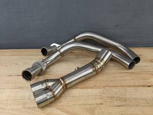 lot 512 image: Exhaust Muffler Parts - Brand New A