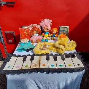 lot 11 image: Dolls, Piano Mat, Dr. Suess and Other Toys and Book