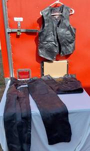 lot 23 image: Leather Motorcycle Apparel including Interstate Leather Vest Size L and Interstate Leather Chaps Size Small. And Milwaukee Vest Liner SizeL