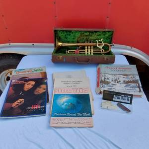 lot 122 image: Grand Rapids by York Trumpet with Case and Sheet Music