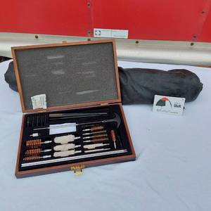 lot 126 image: Gun Cleaning Kit and Popup Canopy