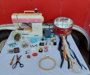 lot 156 image: White W445 Sewing Machine and Sewing Supplies