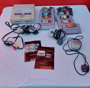 lot 253 image: Super Nintendo with Controllers and Games Including Donkey Kong Country, Super Mario World and More
