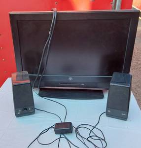 lot 264 image: Small TV and Rocketfish Speakers