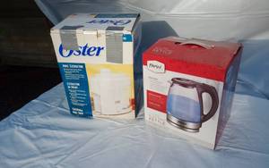 lot 292 image: Oster Juice Extractor (used) and Parini Electric Kettle (New)
