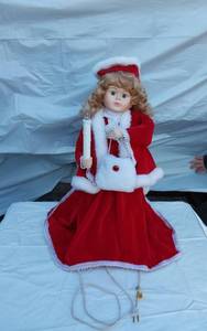 lot 309 image: Doll Dressed as Santa Clause with Lighted Candle
