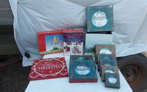 lot 313 image: Christmas Decorative Items including Nesting Boxes, Angel Tree Top and Small Lighted Country Village