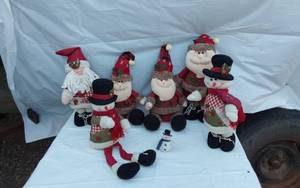 lot 314 image: Santa and Snowman Plush Decor