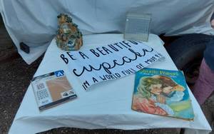 lot 338 image: Be a Beautiful Cupcake Sign, Favorite Prayers Book, Paper Stencils, Decorative Village Water Globe, Glass Block
