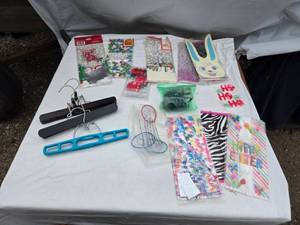 lot 407 image: Holiday and Party Supplies including Gift Bags, Hangers, and Decorations