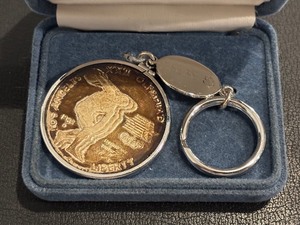 lot 107 image: 1983-S Olympic Silver Dollar on Key Ring