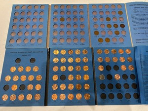 lot 143 image: Lincoln Cents and Book