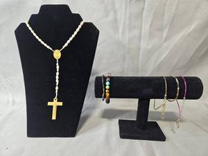 lot 61 image: Assorted Costume Jewelry Lot with Rosary, Bracelets, and Beaded Necklaces - display not inc