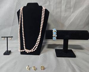 lot 66 image: Vintage Jewelry Lot with Faux Pearl Necklace, Blue Floral Bracelet, Earrings, and Pins - display not inc