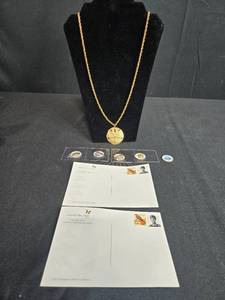 lot 85 image: State Quarter Medallion Collection, Vintage Postcards, and Gold-Tone Chain with Sand Dollar Design - display not inc