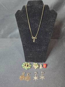 lot 108 image: Avon Holiday Jewelry Lot Bow Necklace and Snowflake Earrings - display not inc