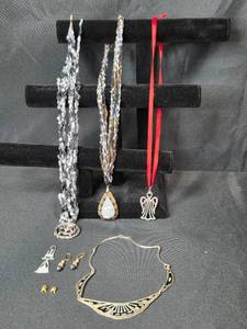 lot 92 image: Jewelry Collection with R. Tennesmed Sweden Pendant, Modernist Necklace, Earrings, and Angel Pendant - display not inc