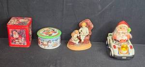 lot 215 image: Christmas Collectibles Lot 2 Holiday Tins, Santa Toy Car, Mother and Child Figurine
