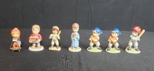 lot 217 image: Set of Vintage Porcelain Figurines Including Baseball and Campbell Soup Kids
