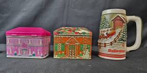 lot 296 image: Budwweiser Mug w Holiday Theme, Holiday Ceramic Figurines and Decorative Tins