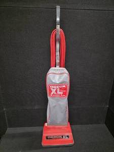 lot 3036 image: ORECK Vacuum Cleaner, Mod. No. XL 8300
