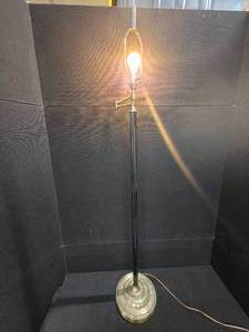 lot 3054 image: mid-century modern design LAMP with a brass swing arm and a dark stem