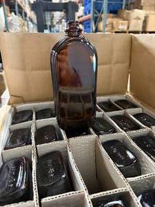 PALLET OF VINTAGE TONIC BOTTLES