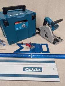 lot 4 image: Makita SP6000J Plunge Circular Saw with TSO guide rail