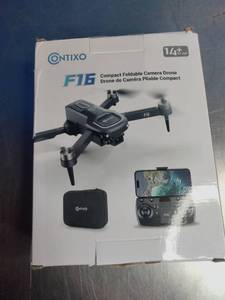 lot 30 image: Contixo F16 Compact Foldable Camera Drone.