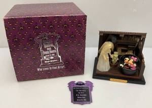 Est. $350.00 - $700.00 Walt Disney World 2003 A Haunted Mansion Scene "Who Lives In Your Attic?" (Works) In Original Box (Needs Light Cleaning)