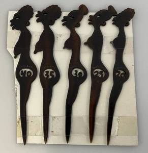 lot 150 image: Vintage Celluloid Zulu Lulu Aging Lady Prank Stir Sticks