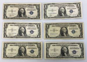 lot 162 image: 1935 A,B & E Silver Certificates 1 Dollar Blue Seal
