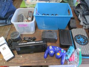 lot 635 image: Nintendo switch case, misc remotes,...