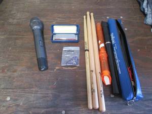 lot 644 image: Drumsticks, wireless microphone and...