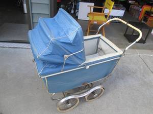 lot 535 image: Oversized Antique Baby buggy stroll...