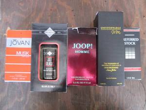 lot 546 image: Various new bottles of mens cologn...