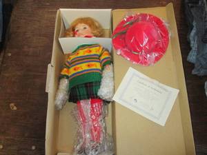 lot 805 image: Porcelain Doll with Stand...