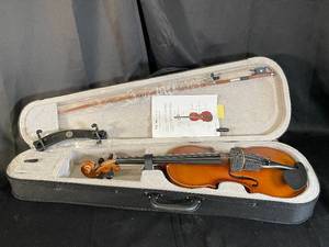 lot 26 image: 44 Full Size Violin Outfit with Case, Bow, Tuner, and Accessories