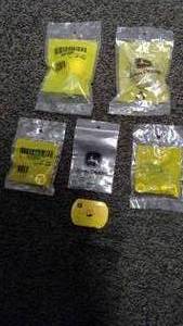 lot 27 image: John Deere Assorted Fuel filters, pins, and nuts