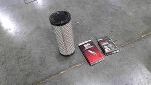 lot 270 image: John deere air filter, random spark plugs