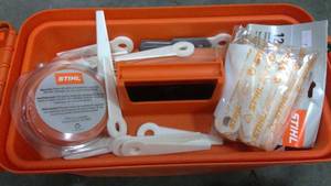 lot 304 image: Stihl Weedwacker blades and heads